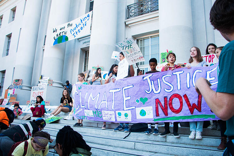 Climate Justice Now sign at Berkeley student-led climate strike