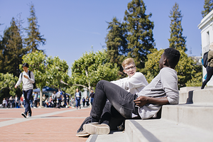 2 students talking on Sproul steps